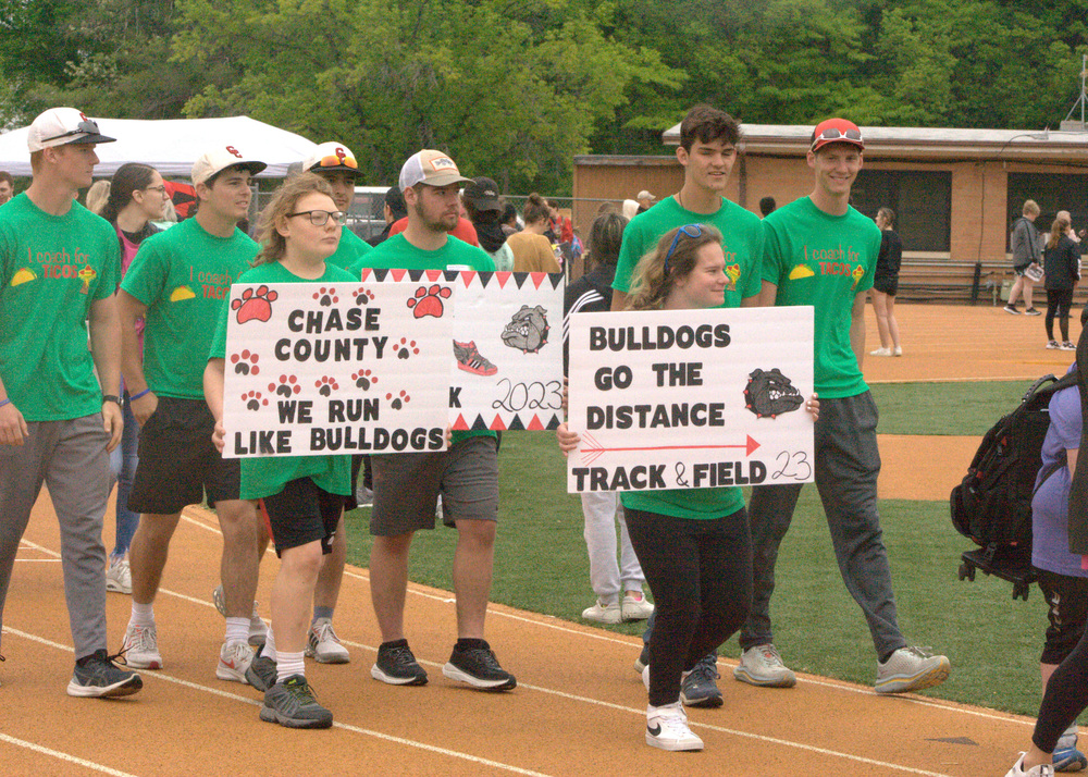 Special Olympics students walk up.
