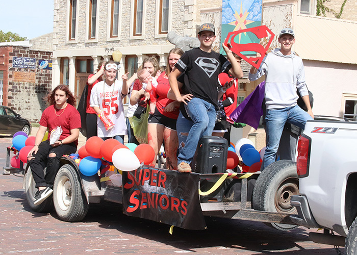 Senior students ride their float during the parade. Photo by Linda Drake