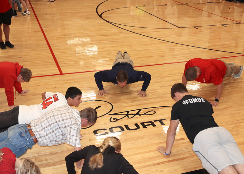 Students do push-ups for the Air Force event at Career Day. Mitchell Budke did the most push ups at 57. Photo by Linda Drake