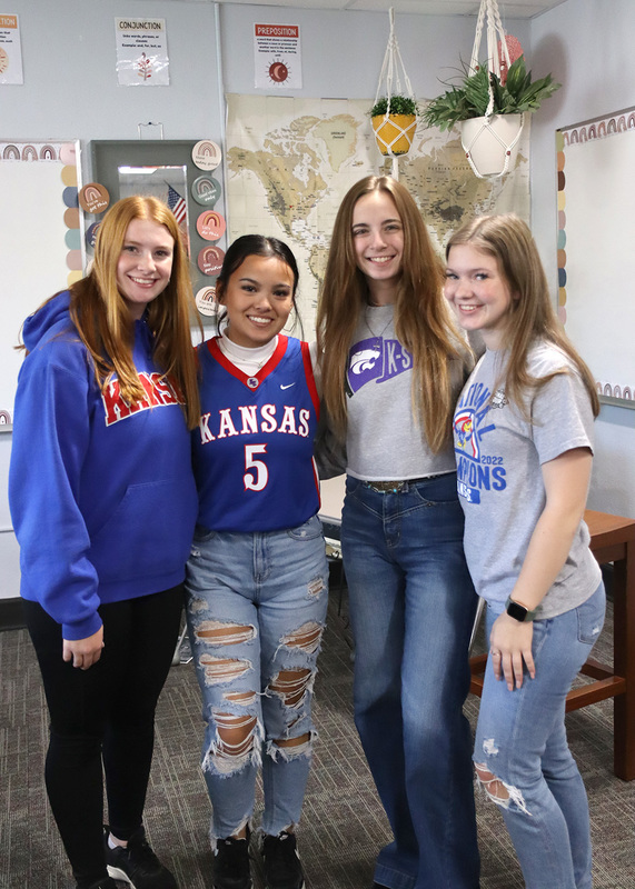 Senior students pose for picture during KU vs KSTATE day. Photo by Grace O'Brien