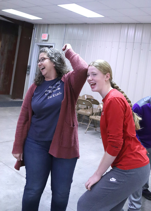 English instructor Alison Eidman and freshman Madelyn Wilson play "People to People". Photo by Linda Drake