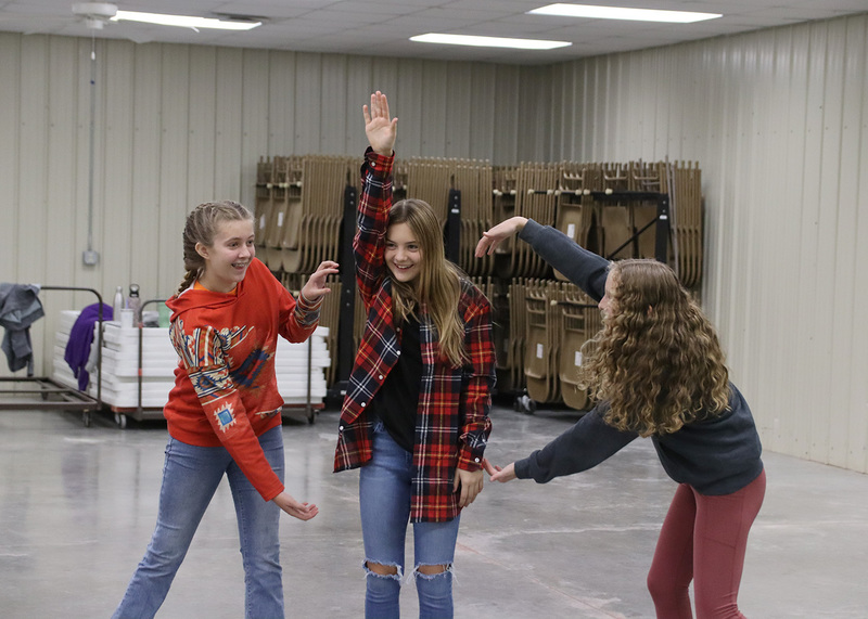 Seventh graders Lexi Price, Dakota Phillips, Hadley Holloway play the "animal game". Photo by Linda Drake