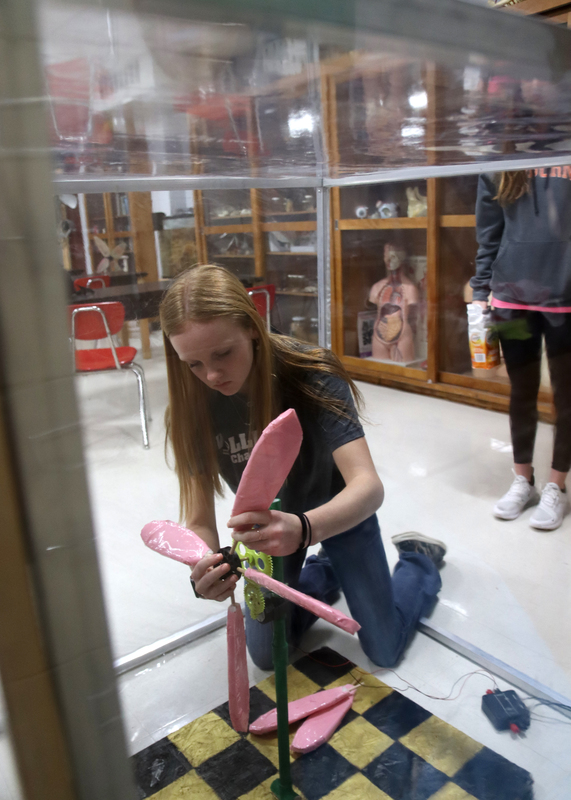 Eighth Grader Natalie Neff tests her windmill for competition. Photo by Ashlee Williams