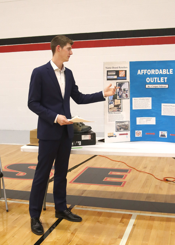 Senior Cooper Schroer presents his business "Affordable Outlet". Photo by Alexis DeLong